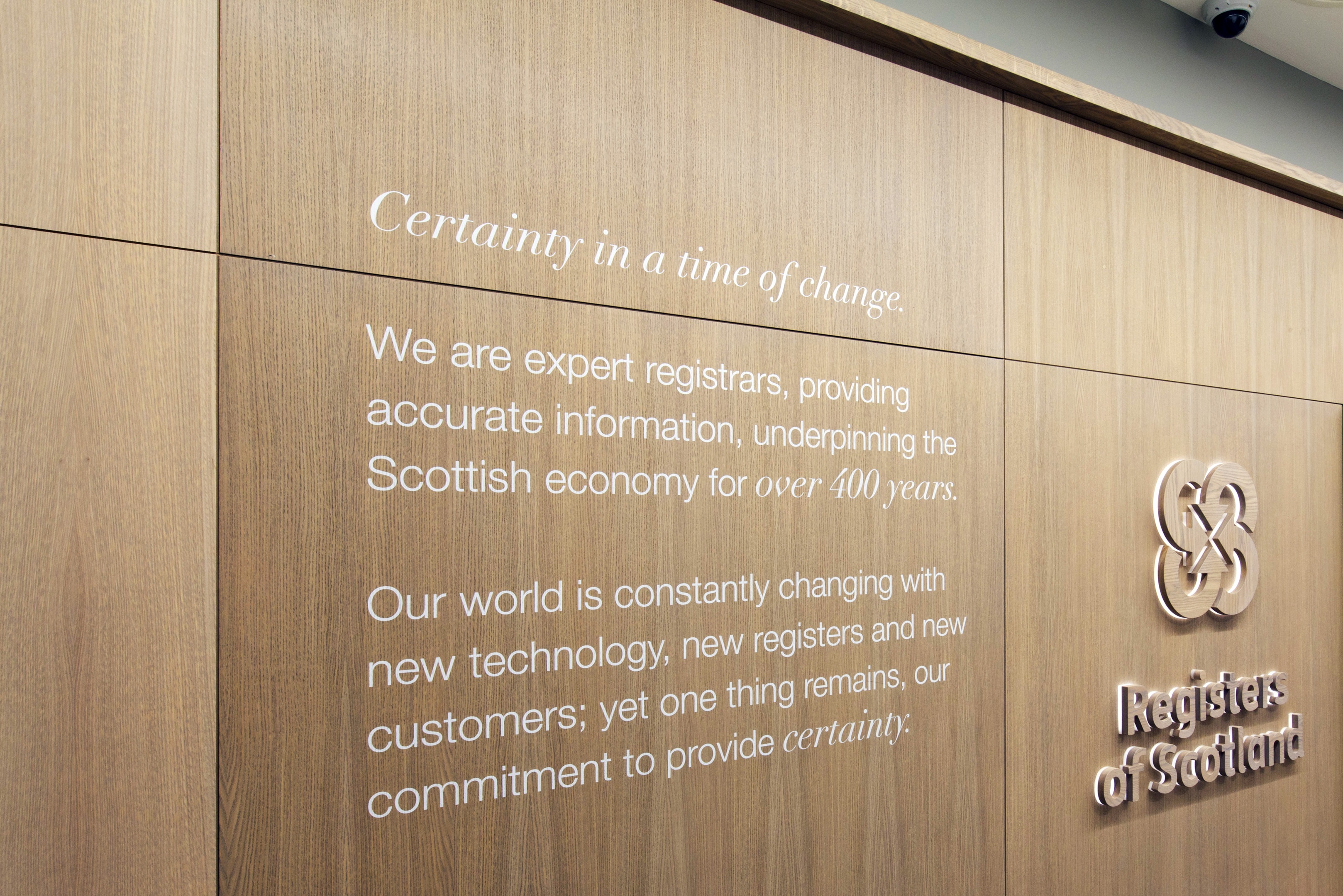 Quote on the wall saying ' Certainty in a time of change