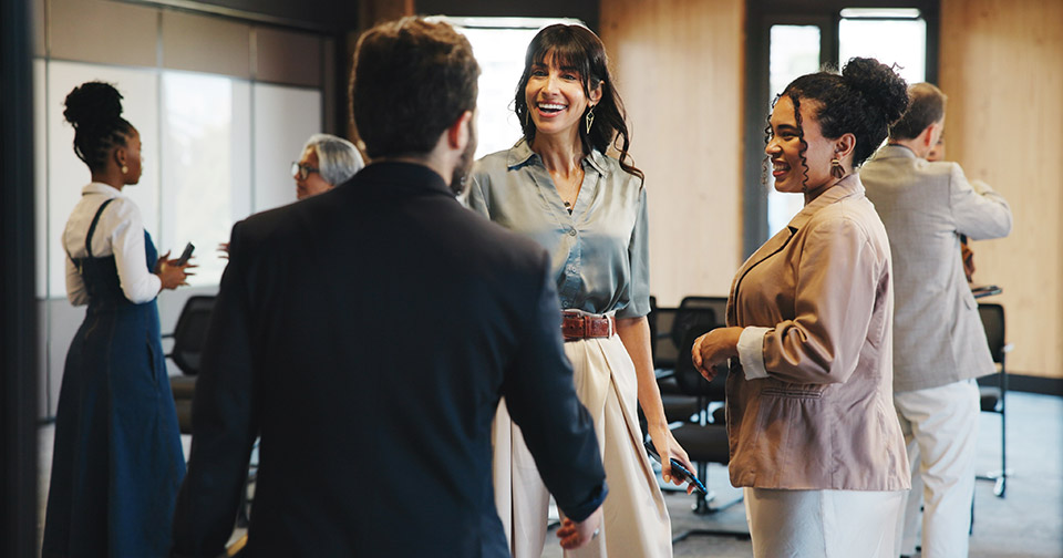people meeting up at an event and networking