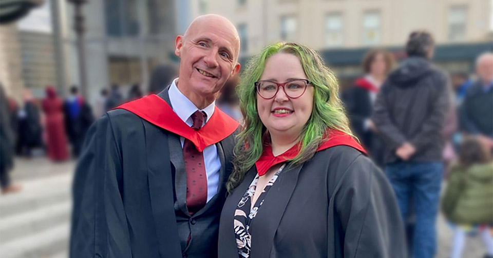 University graduates at graduation ceremony